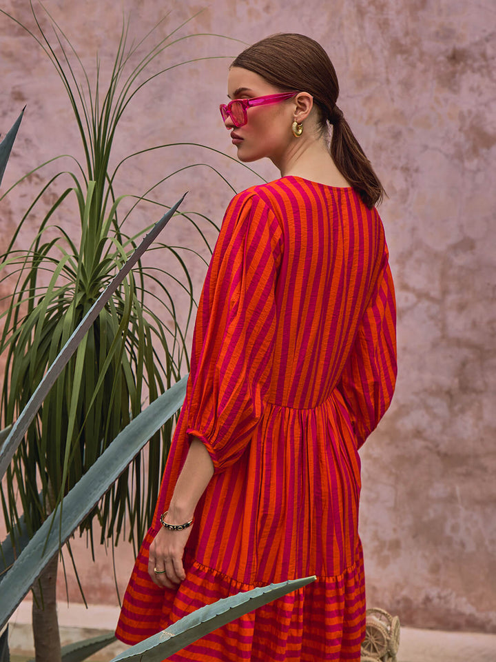 vacation dress | Candy Stripe Dress | stripe dress | V-neckline dress | v neck dress | Red dress | valentine dress | girls valentine fashion | couple date dress | brunch wear | resort dress | dinner party dress | party dresses | short dress | red classic dress | bold dress