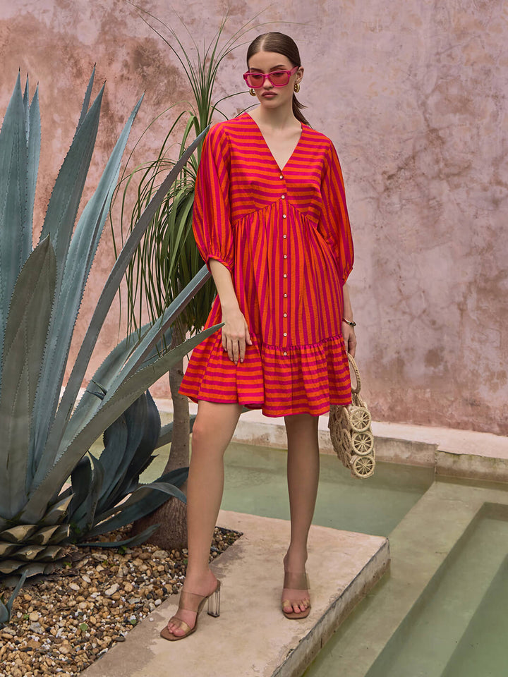 vacation dress | Candy Stripe Dress | stripe dress | V-neckline dress | v neck dress | Red dress | valentine dress | girls valentine fashion | couple date dress | brunch wear | resort dress | dinner party dress | party dresses | short dress | red classic dress | bold dress